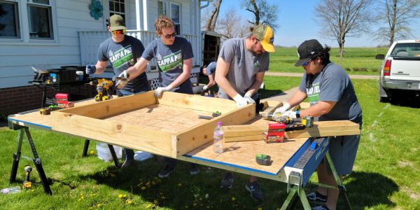 Volunteer team working outdoors